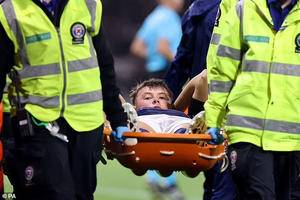 Everton suffer ANOTHER injury setback as Nathan Patterson is stretchered off during Scotland's Nations League win over Ukraine... as national coach Steve Clarke admits it 'doesn't look good' for the full-back