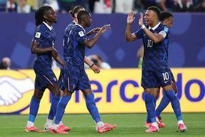 Mbappe double sends France through after weather-hit win over Iraq